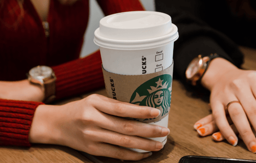 hands-holding-starbucks-cup